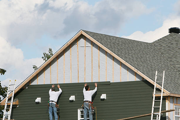 Professional Vinyl Siding technician working in Phoenix, NY